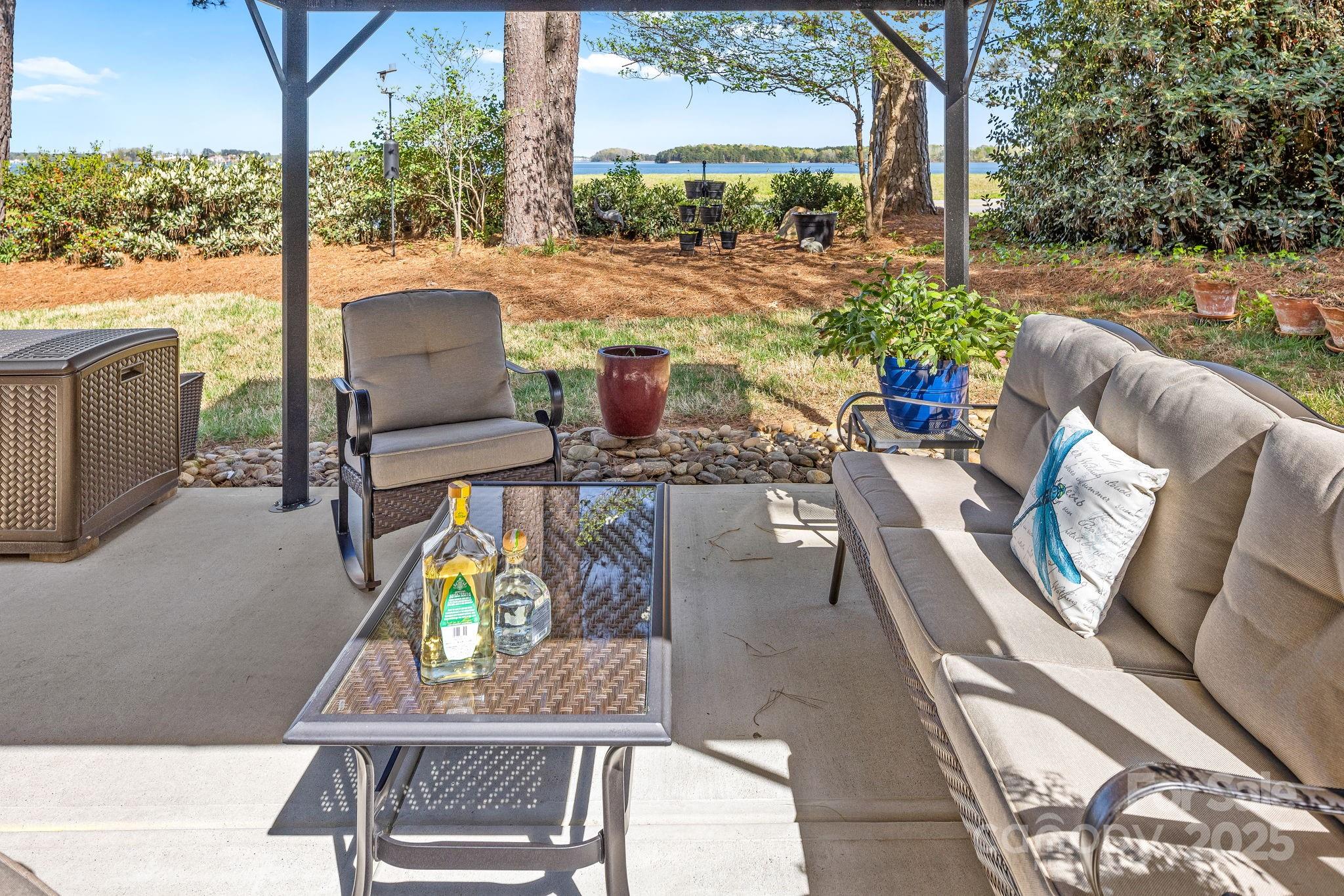 796 Lake Mist Drive Stanley, NC 28164 - Photo 38 of 43 a view of an outdoor sitting area with furniture and wooden floor