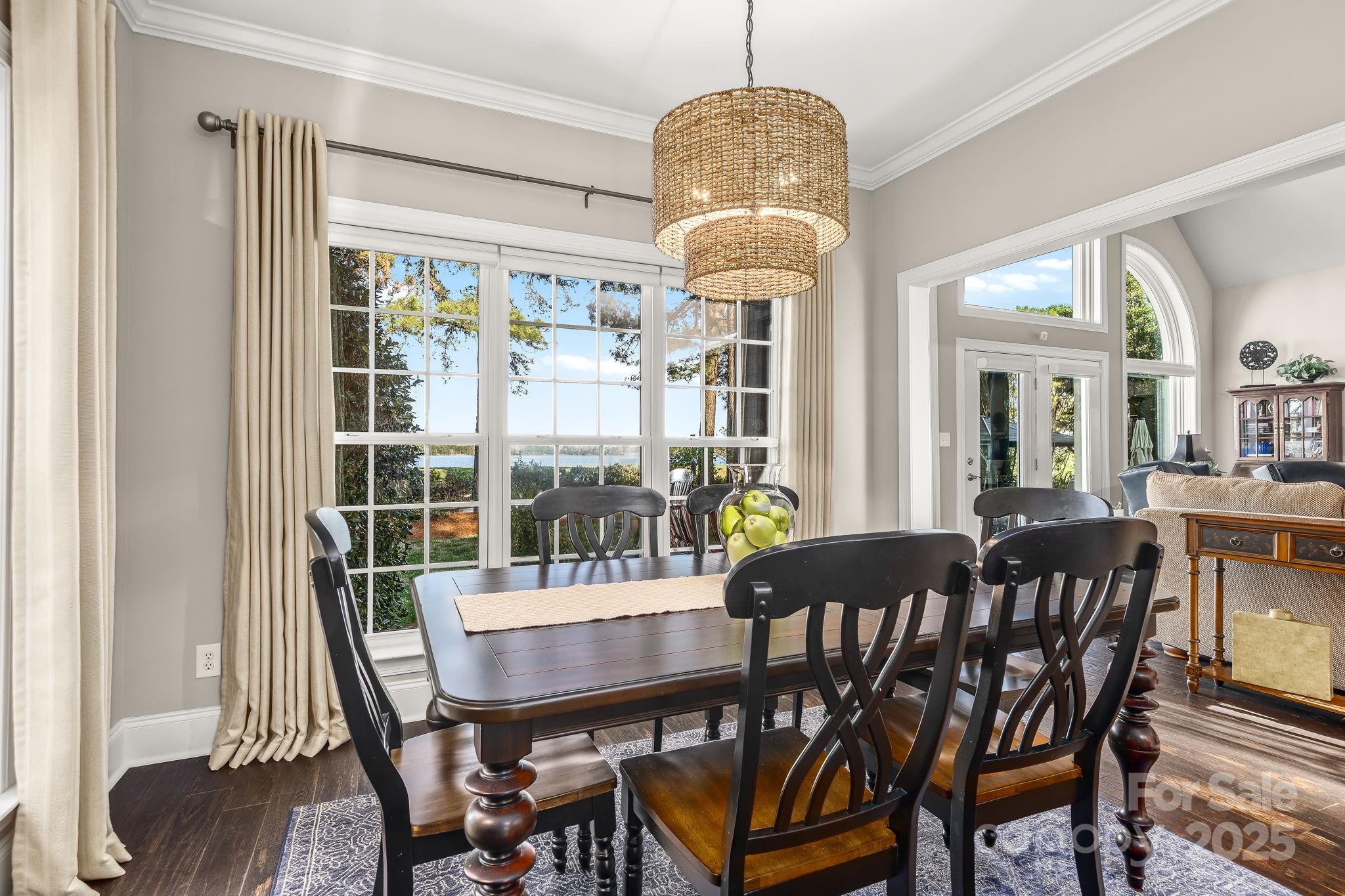 796 Lake Mist Drive Stanley, NC 28164 - Photo 10 of 43 a view of a dining room with furniture window and wooden floor