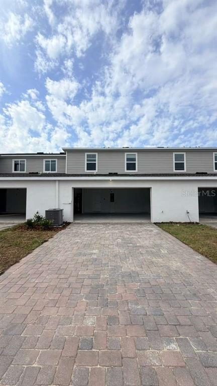 5174 Clay Whaley Road St. Cloud, FL 34772 - Photo 24 of 25 a view of a terrace with kitchen