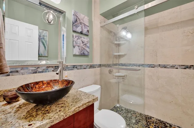 $425,000 | 121 Golden Isles Drive, Unit 205, Hallandale Beach, FL 33009