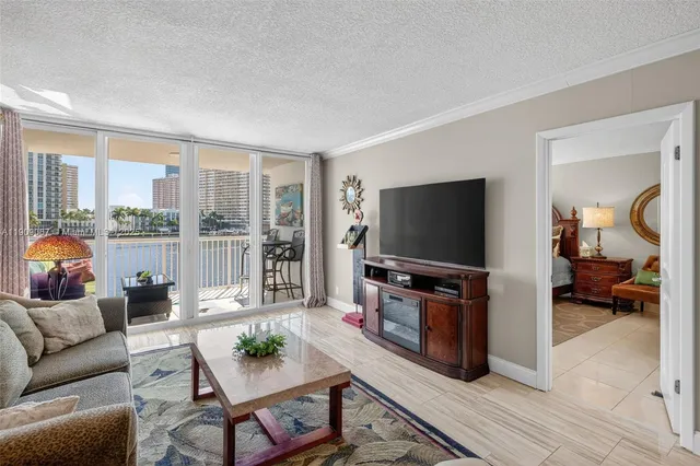 $425,000 | 121 Golden Isles Drive, Unit 205, Hallandale Beach, FL 33009