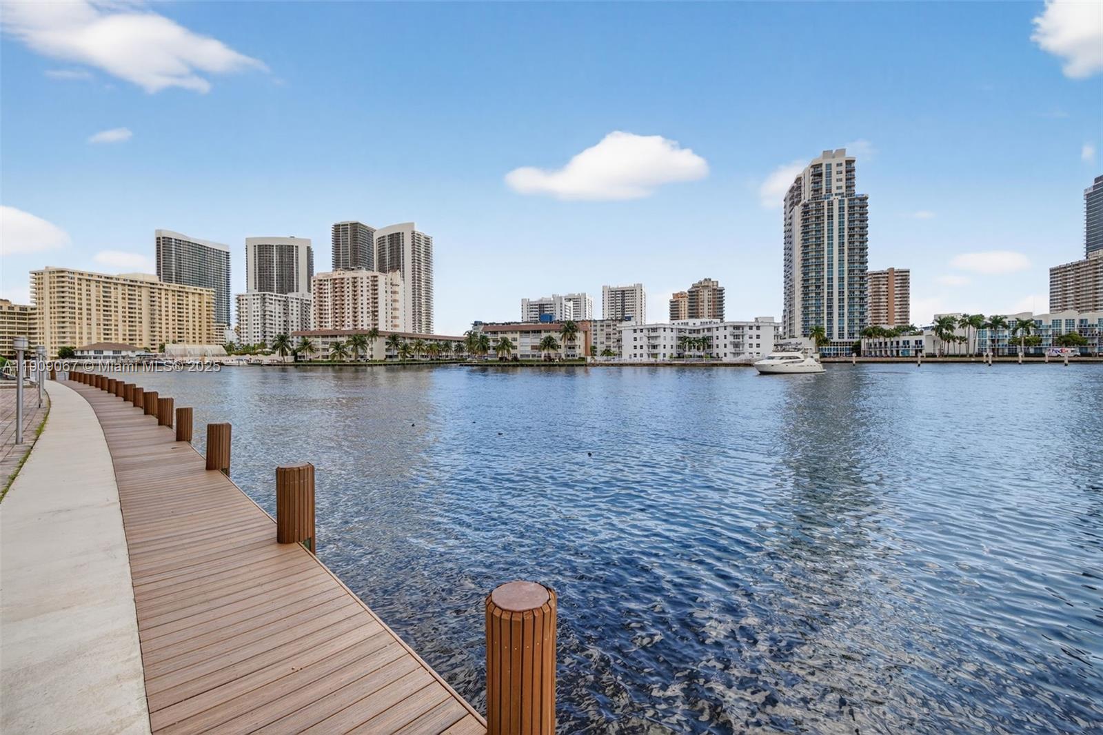 121 Golden Isles Drive, Unit 205 Hallandale Beach, FL 33009 - Photo 48 of 82 a view of a city with tall buildings