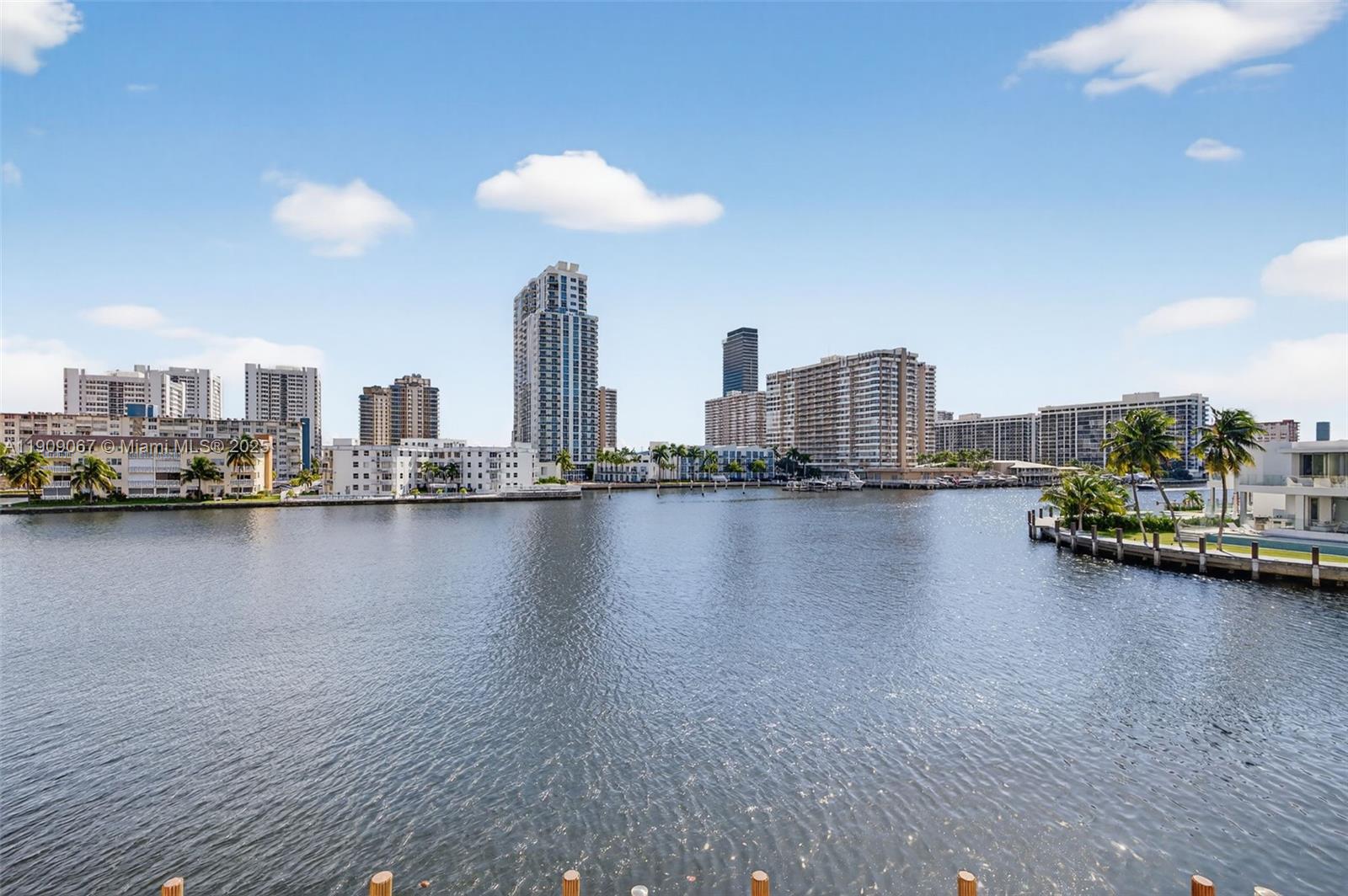 121 Golden Isles Drive, Unit 205 Hallandale Beach, FL 33009 - Photo 55 of 82 a view of a city with tall buildings