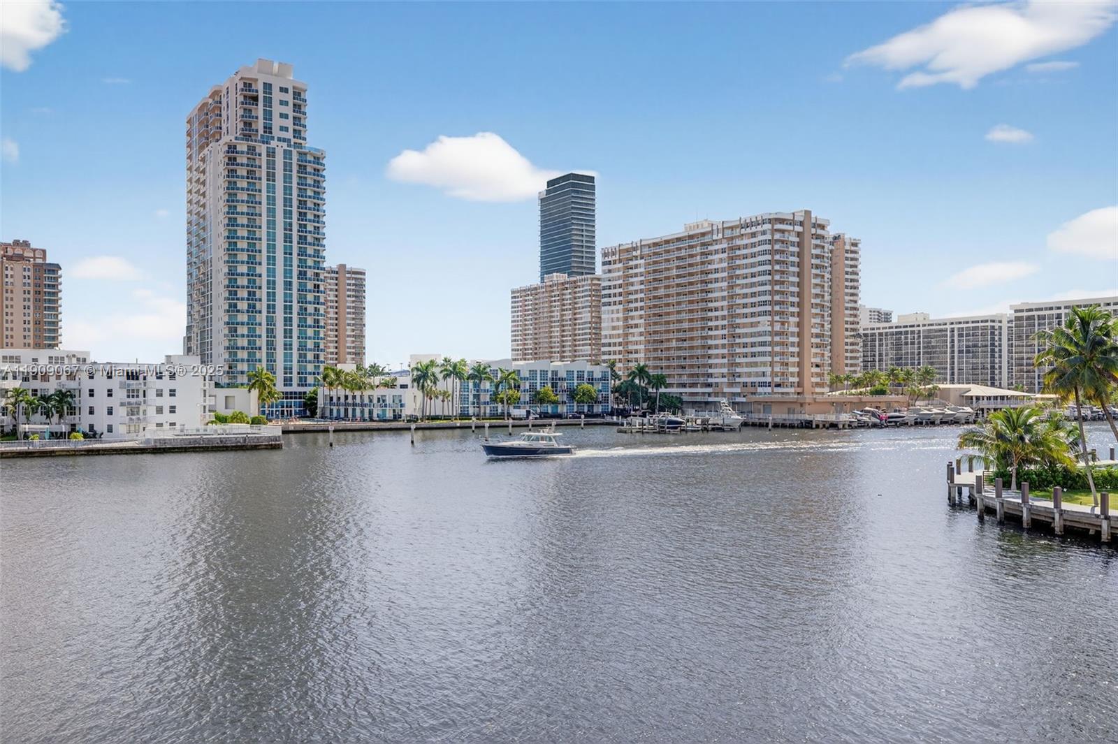 121 Golden Isles Drive, Unit 205 Hallandale Beach, FL 33009 - Photo 56 of 82 a view of a city with tall buildings