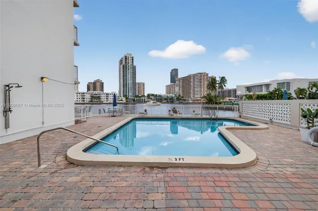 $425,000 | 121 Golden Isles Drive, Unit 205, Hallandale Beach, FL 33009