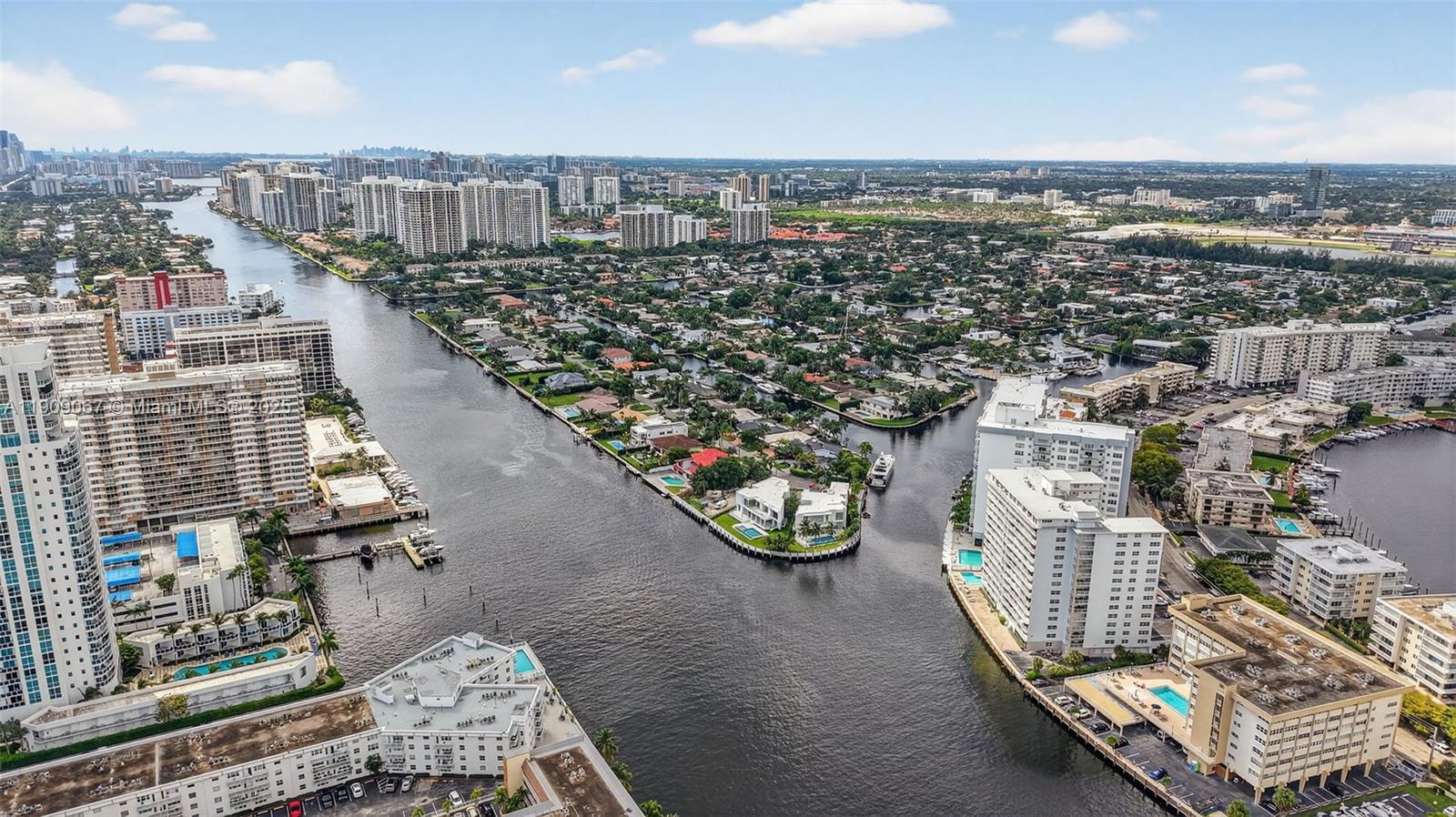 121 Golden Isles Drive, Unit 205 Hallandale Beach, FL 33009 - Photo 78 of 82 an aerial view of a city