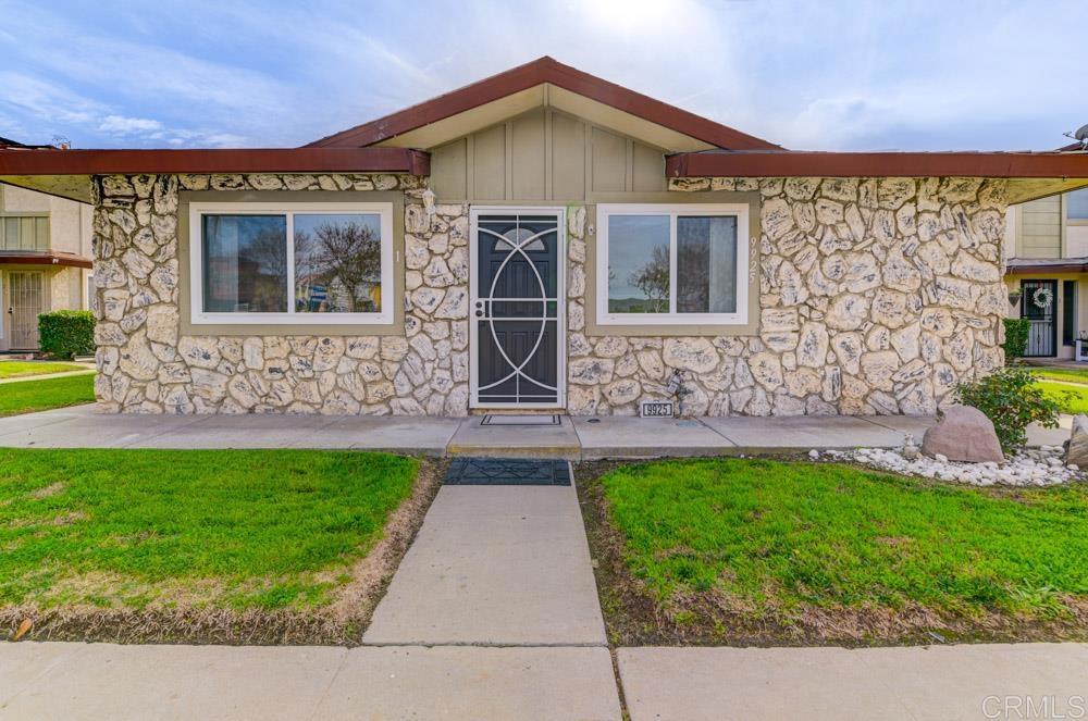 9925 Mission Gorge Road, Unit 1 Santee, CA 92071 - Photo 1 of 1 a front view of a house with garden