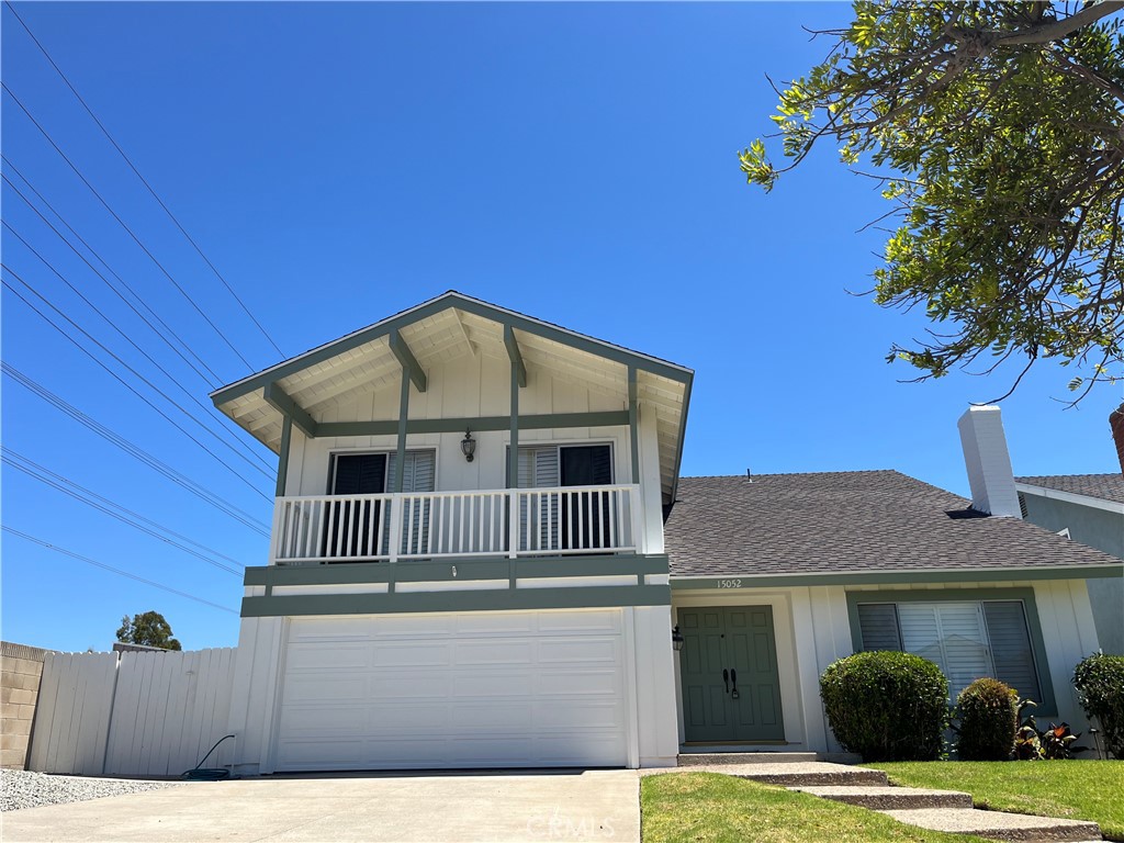 15052 Clemons Circle Irvine, CA 92604 - Photo 2 of 38 a front view of a house with garden