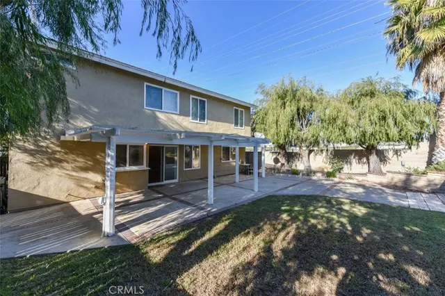a view of a house with a patio
