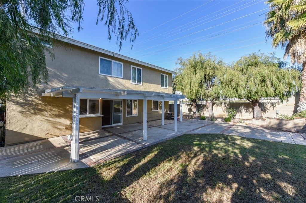 15052 Clemons Circle Irvine, CA 92604 - Photo 34 of 38 a view of a house with a patio