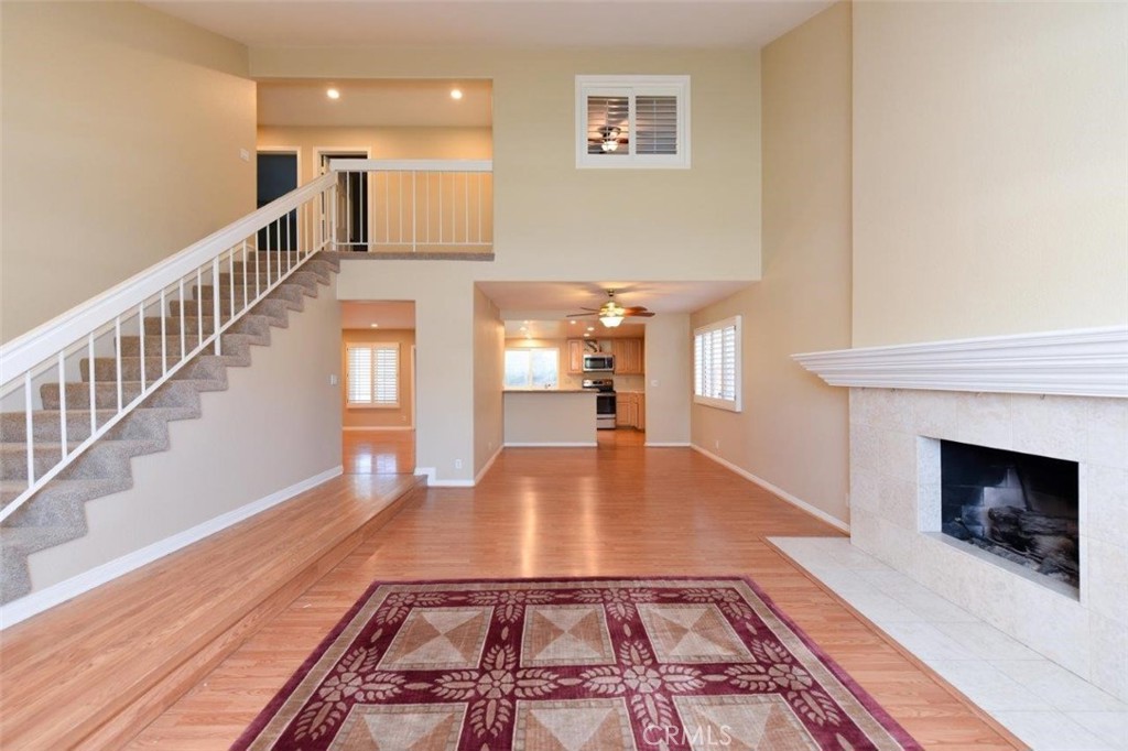 15052 Clemons Circle Irvine, CA 92604 - Photo 4 of 38 a view of a living room with a fireplace