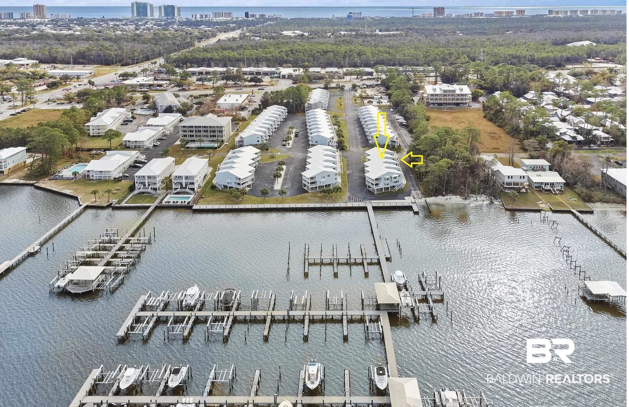 25861 Canal Road, Unit 77 Orange Beach, AL 36561 - Photo 7 of 48 View of urban area with a nearby body of water