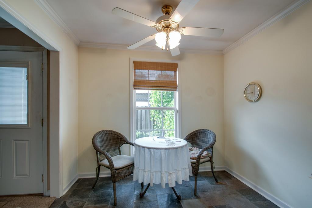 1101 General George Patton Road, Unit 1101 Nashville, TN 37221 - Photo 13 of 30 a view of a dining room with furniture window and wooden floor