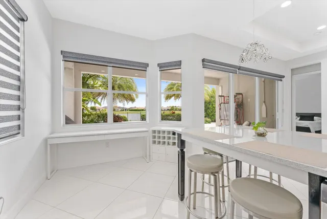 a bedroom with a bed and a chair