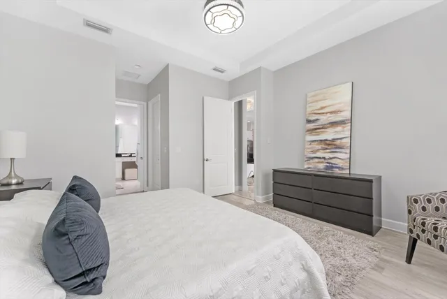 a bathroom with a sink vanity and a mirror