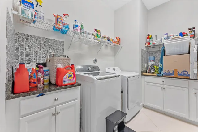 a view of outdoor space with swimming pool and seating