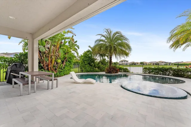 a view of outdoor space with swimming pool