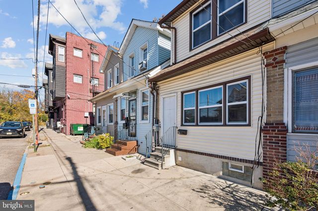 a view of a building with sitting area