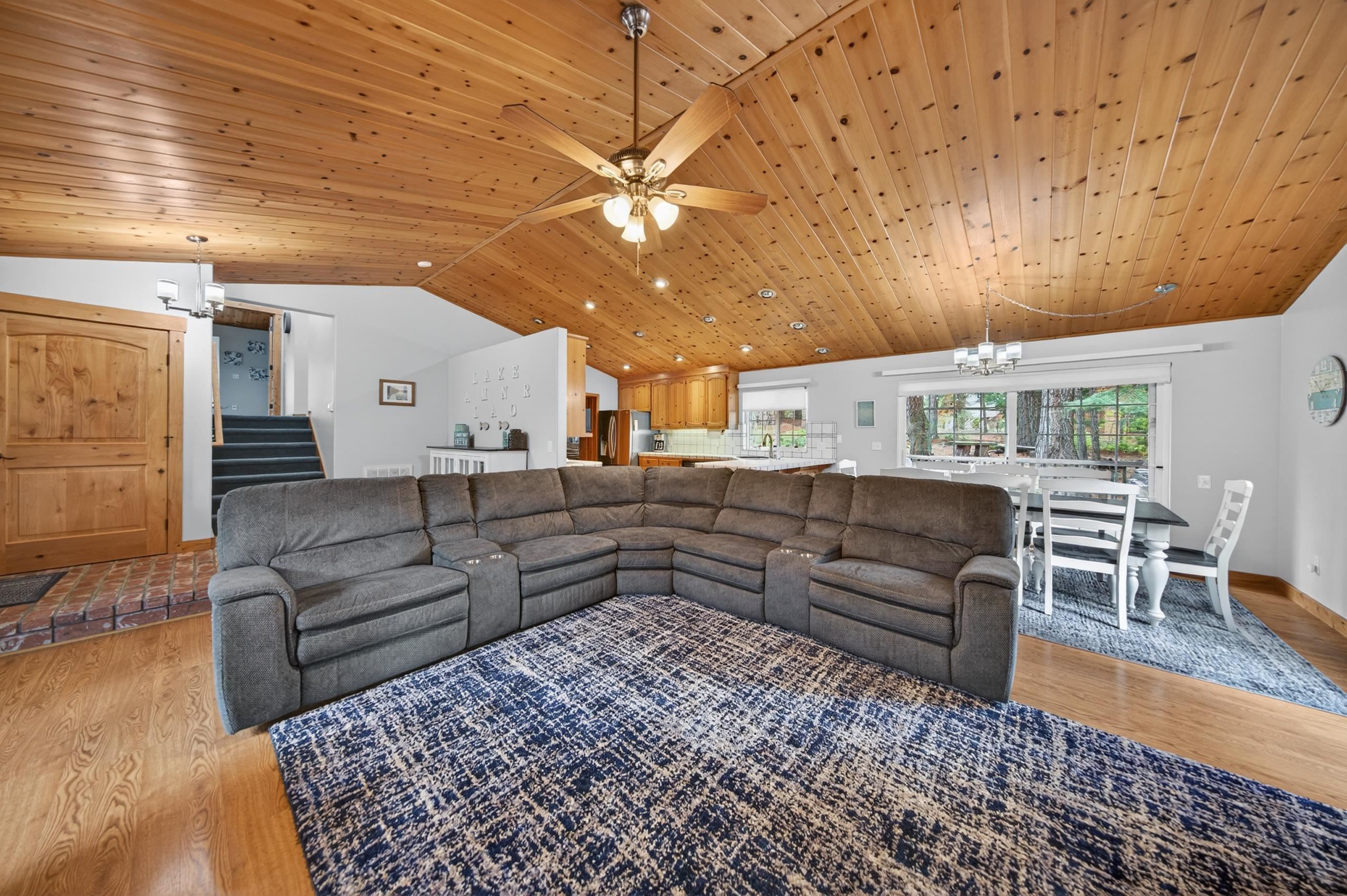 1220 Lynx Road Lake Almanor, CA 96137 - Photo 10 of 45 a living room with furniture and wooden floor