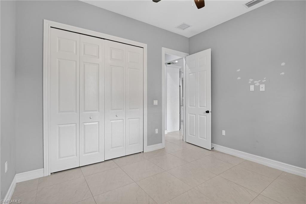 2642 10th Avenue Northeast Naples, FL 34120 - Photo 28 of 38 a view of an empty room