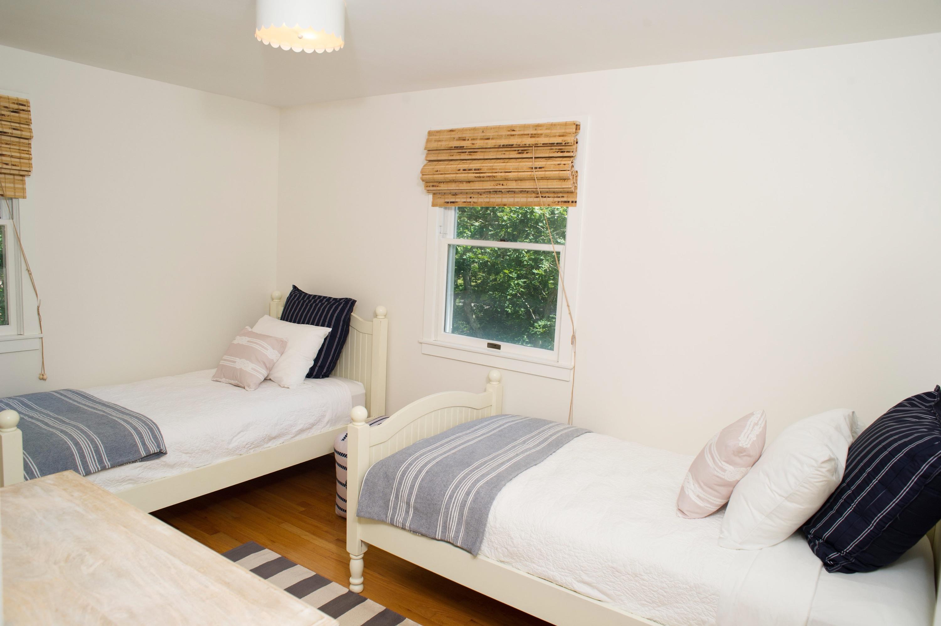 51 Old Purchase Road Edgartown, MA 02539 - Photo 12 of 24 a bedroom with a bed and window