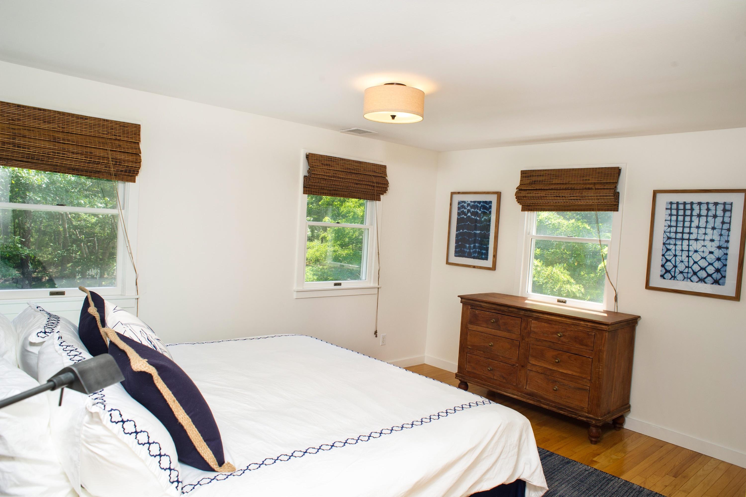 51 Old Purchase Road Edgartown, MA 02539 - Photo 18 of 24 a bedroom with a bed and a window