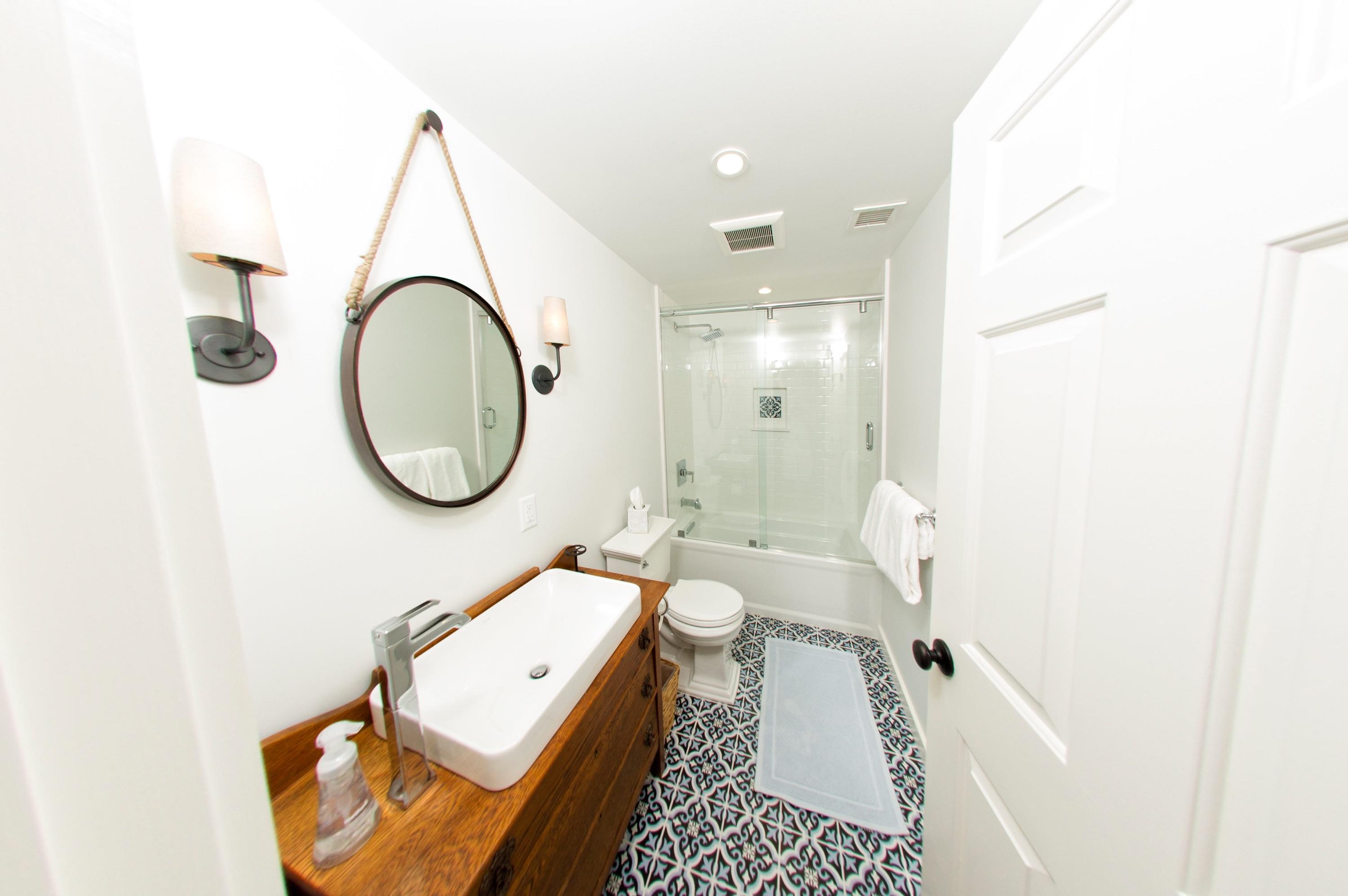 51 Old Purchase Road Edgartown, MA 02539 - Photo 19 of 24 a living room with a bed furniture and a mirror