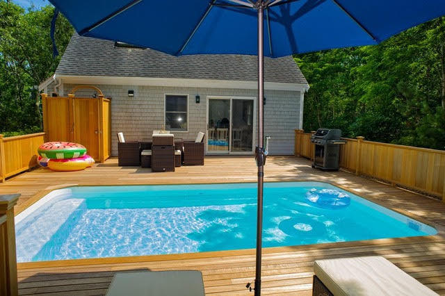 51 Old Purchase Road Edgartown, MA 02539 - Photo 2 of 24 a view of a house with backyard and sitting area