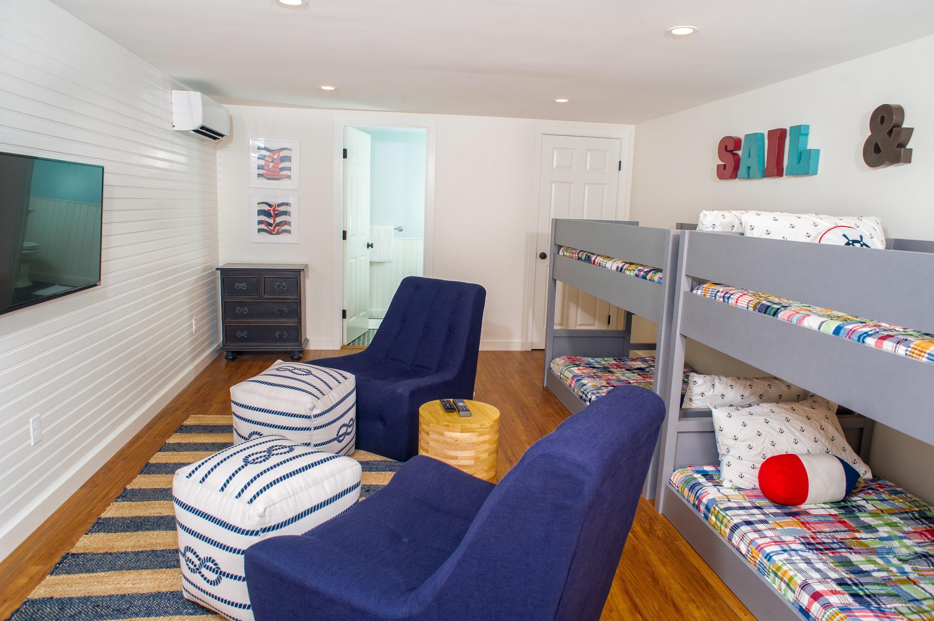 51 Old Purchase Road Edgartown, MA 02539 - Photo 23 of 24 a living room with furniture and flat screen tv