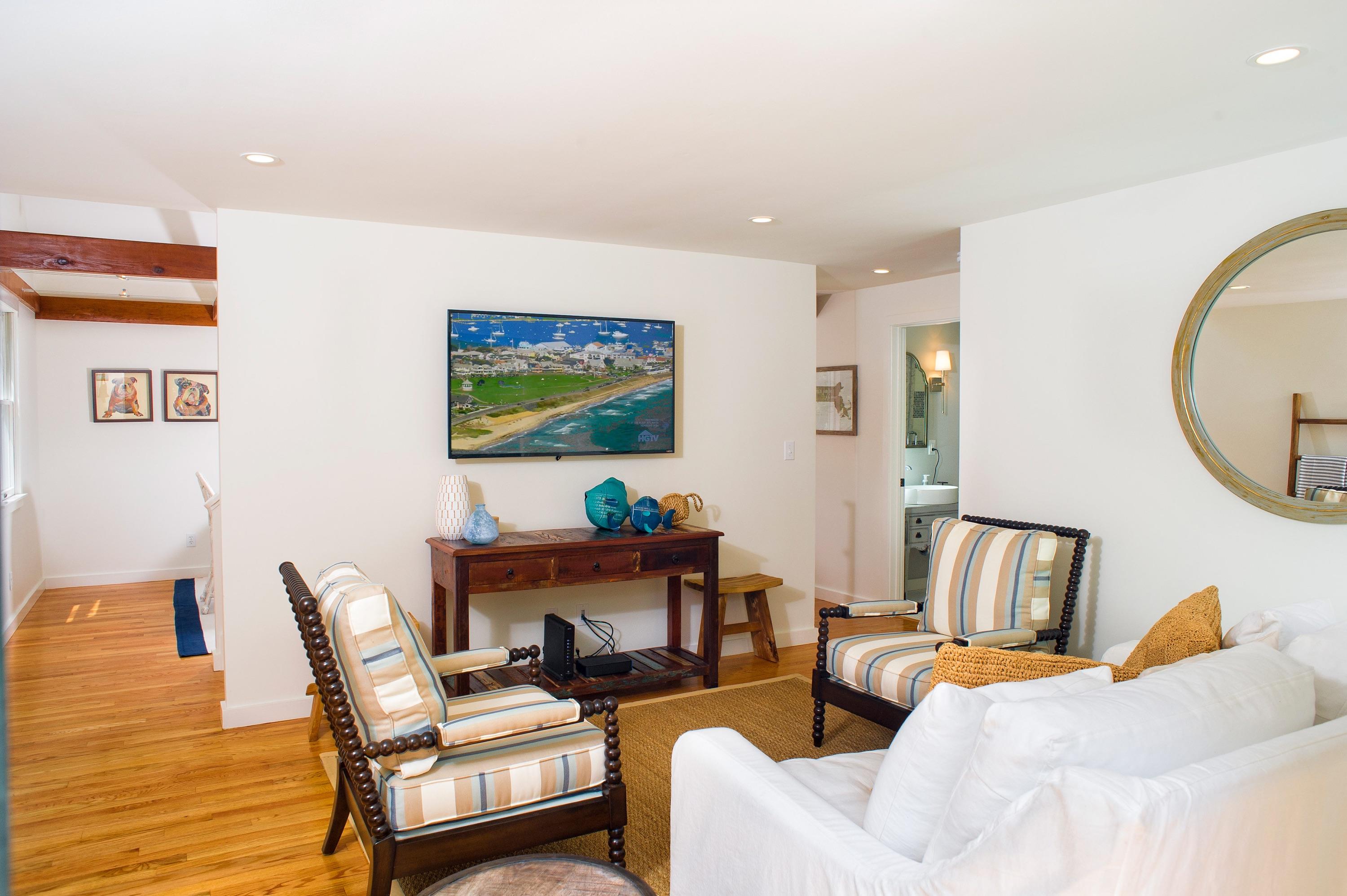 51 Old Purchase Road Edgartown, MA 02539 - Photo 6 of 24 a bedroom with furniture and a mirror