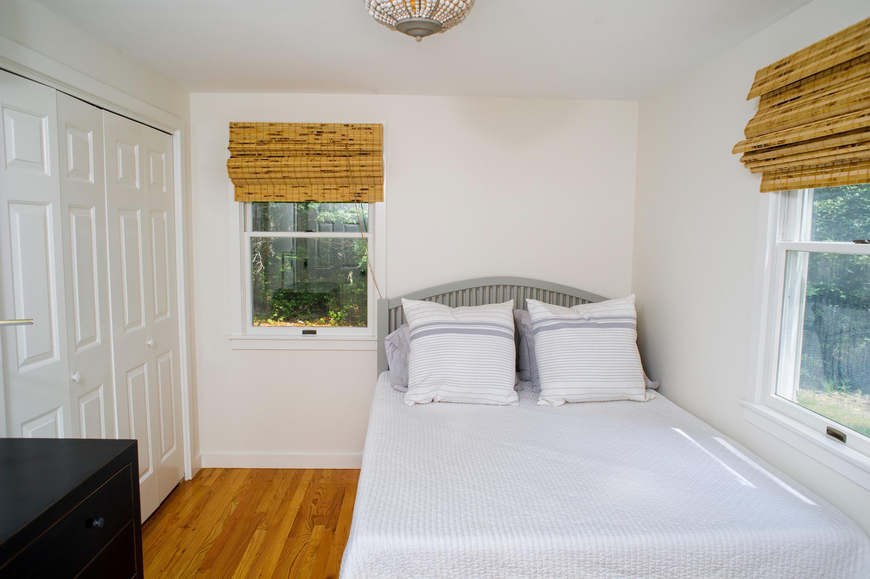 51 Old Purchase Road Edgartown, MA 02539 - Photo 10 of 24 a bedroom with a bed and a window