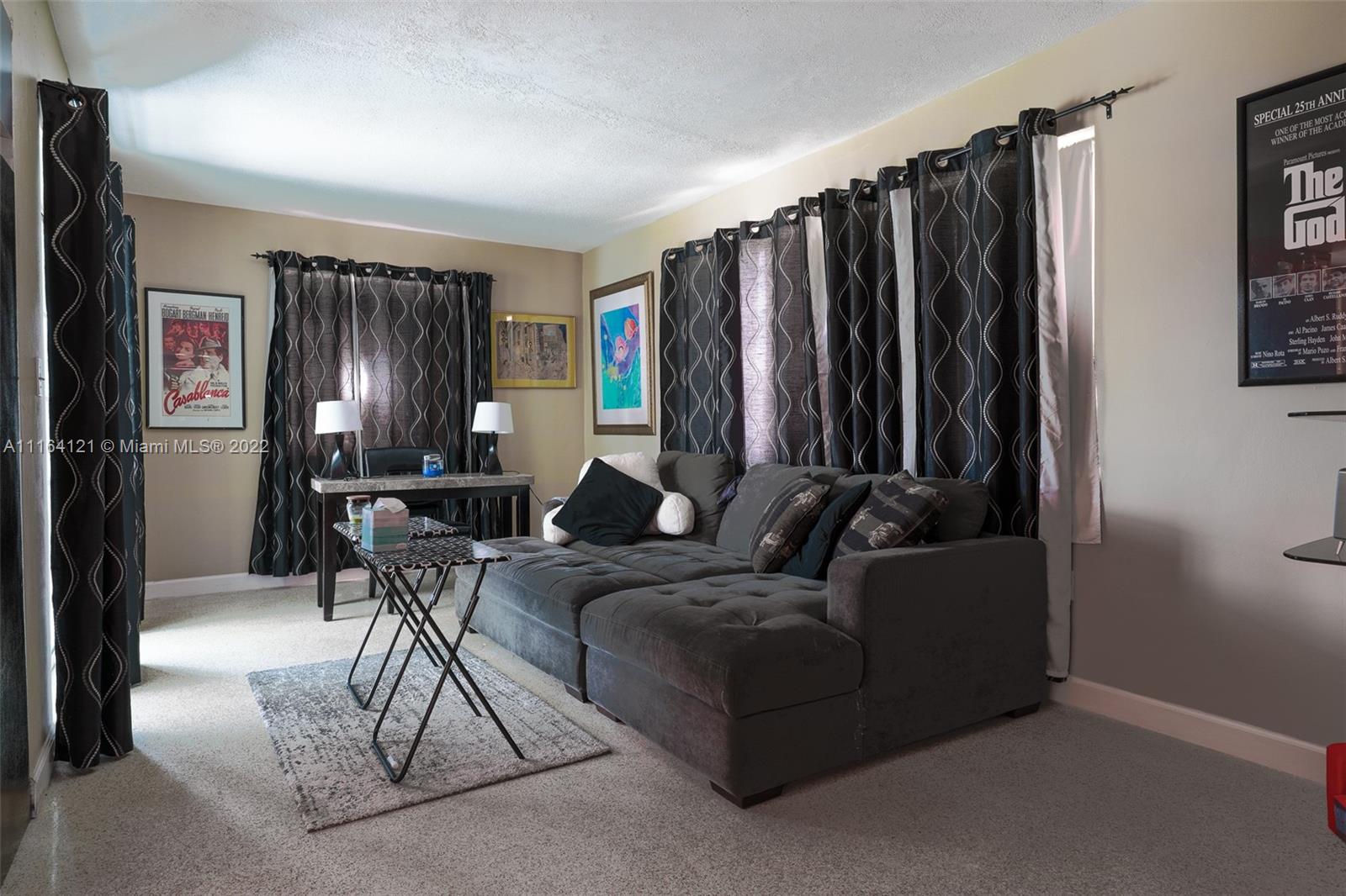 Cooper Colony Estates Cooper City, FL 33328 - Photo 13 of 33 a living room with furniture a ceiling fan and a wooden floor