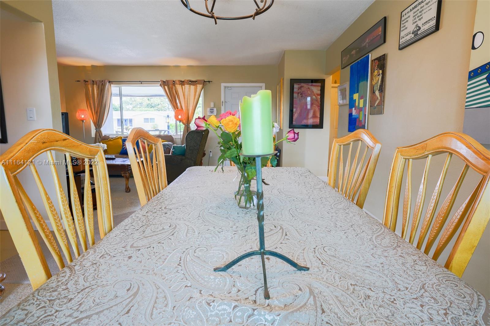 Cooper Colony Estates Cooper City, FL 33328 - Photo 18 of 33 a view of a livingroom with furniture wooden floor and windows