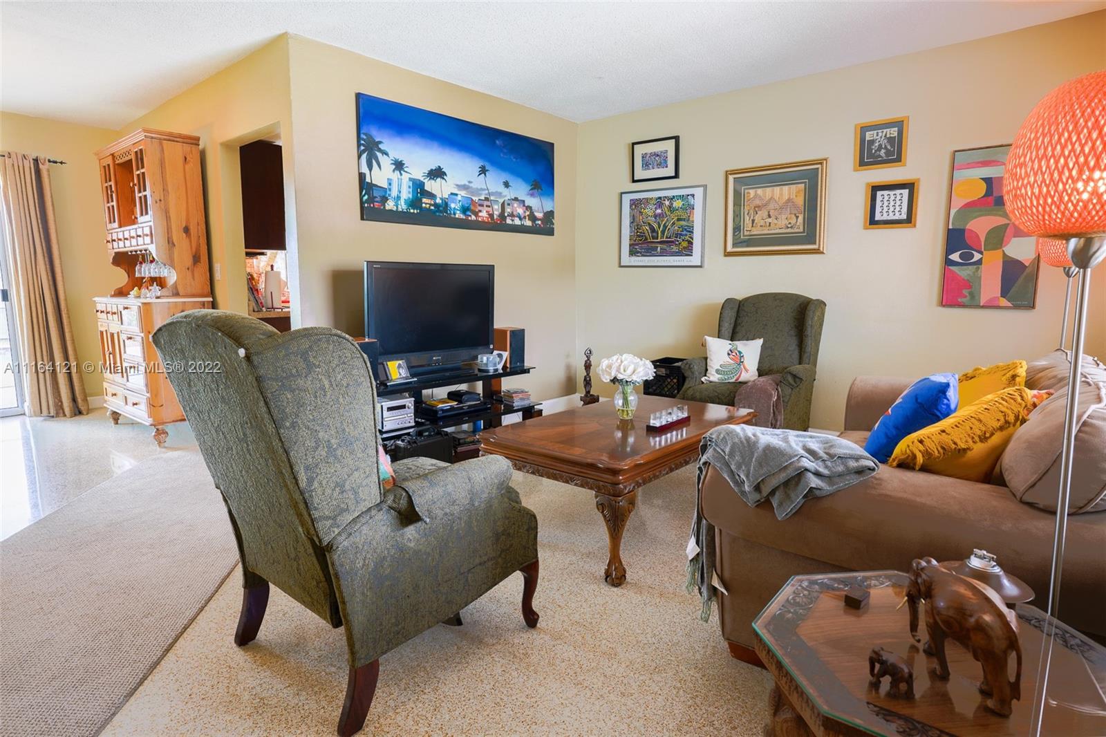 Cooper Colony Estates Cooper City, FL 33328 - Photo 19 of 33 a living room with furniture and a flat screen tv