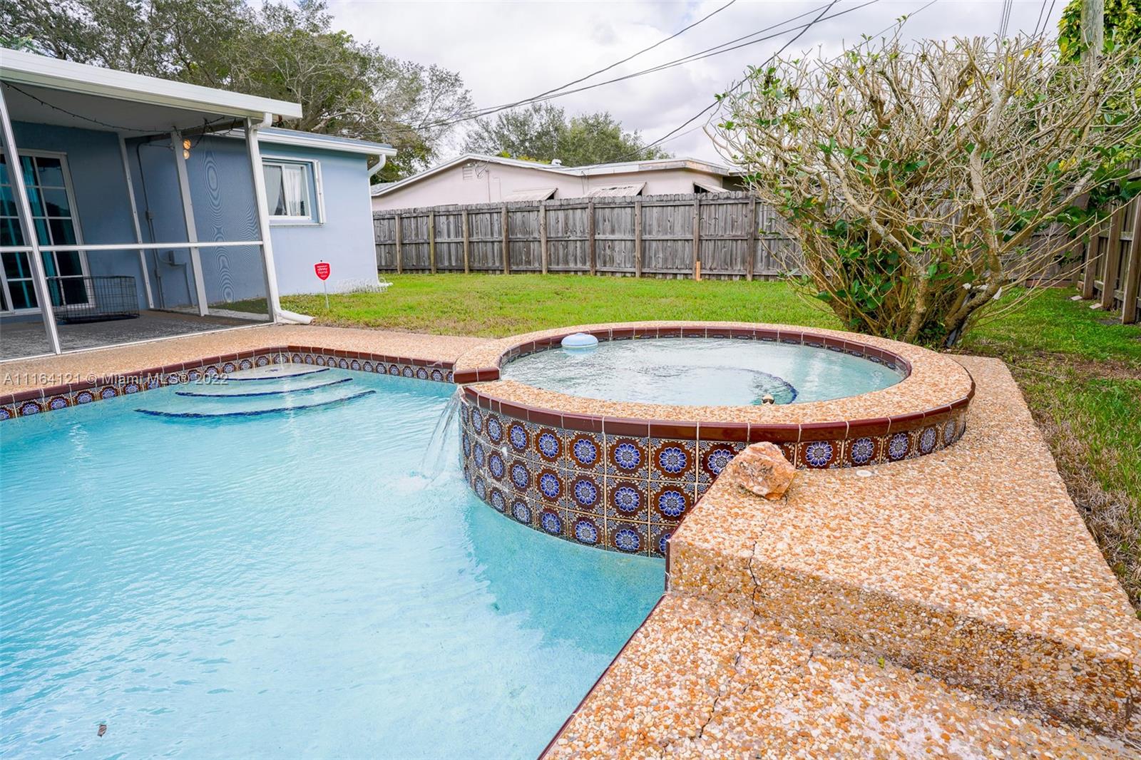 Cooper Colony Estates Cooper City, FL 33328 - Photo 22 of 33 a view of a house with pool and a yard