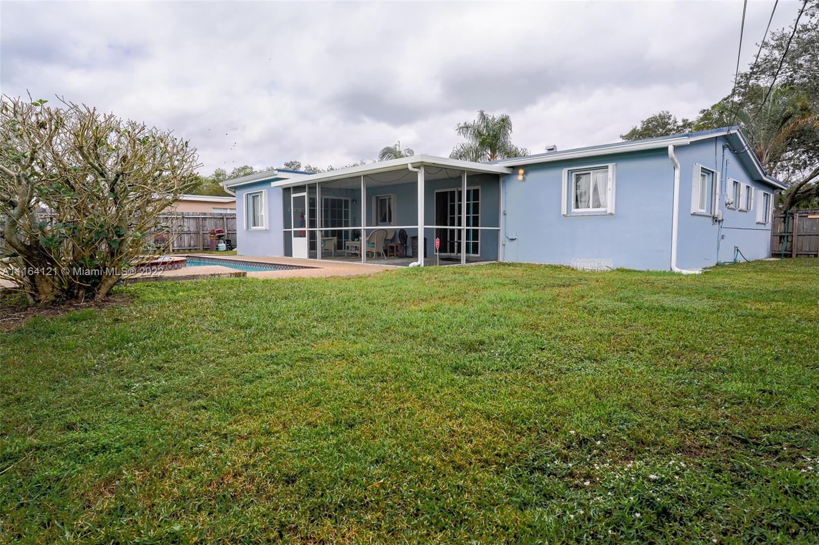 Cooper Colony Estates Cooper City, FL 33328 - Photo 24 of 33 a view of a house with a backyard