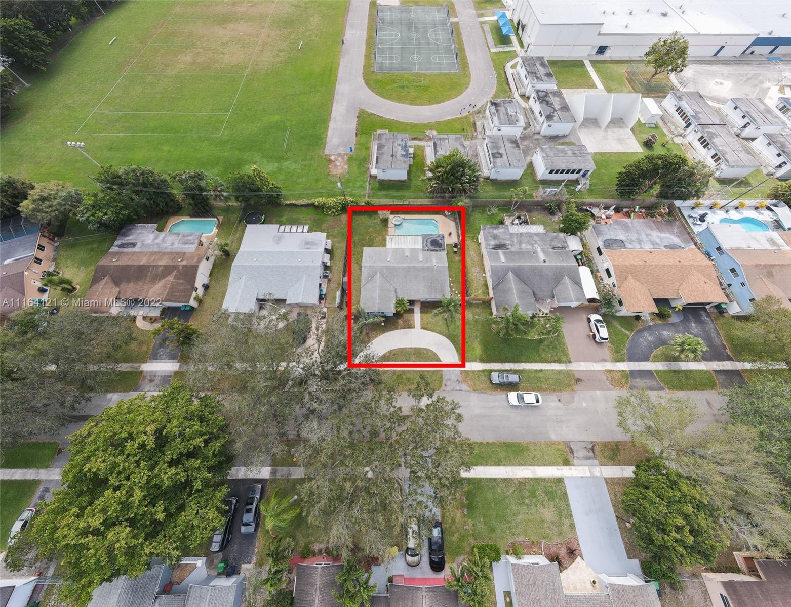 Cooper Colony Estates Cooper City, FL 33328 - Photo 31 of 33 an aerial view of a house with a yard and lake view