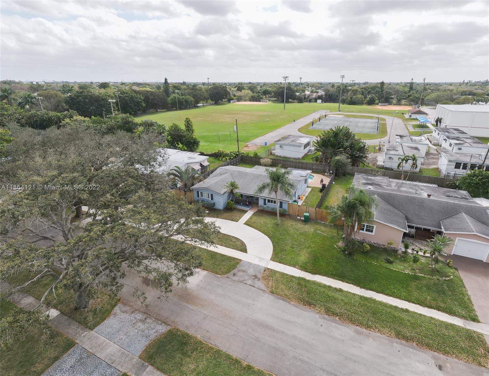 Cooper Colony Estates Cooper City, FL 33328 - Photo 33 of 33 an aerial view of a house with a lake view