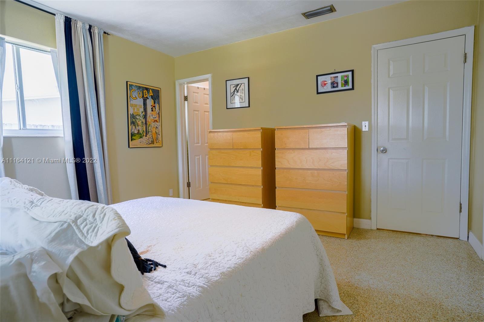 Cooper Colony Estates Cooper City, FL 33328 - Photo 10 of 33 a bedroom with a bed and a closet