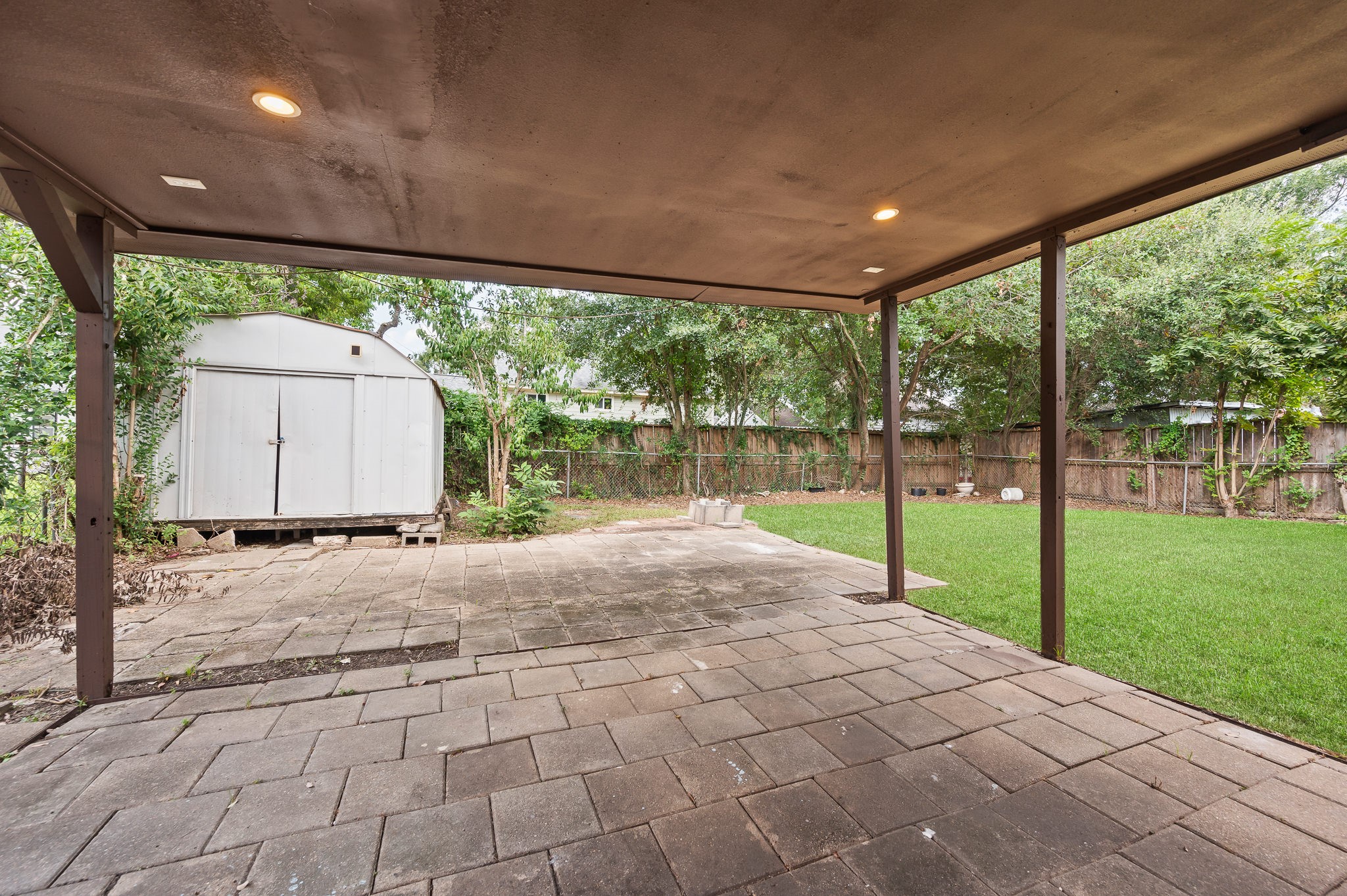 3823 Florinda Street Houston, TX 77021 - Photo 39 of 41 Extended covered patio w/ a metal shed
