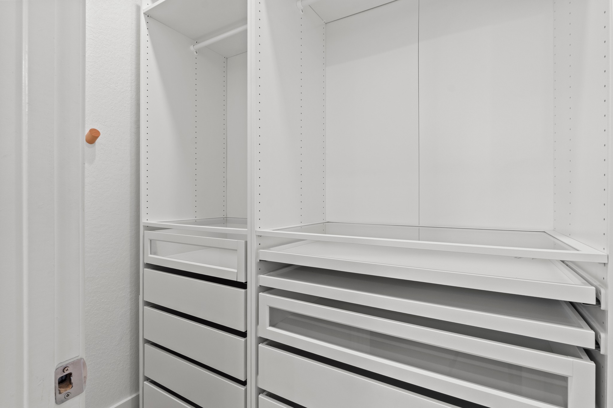 1101 Skeeter Cove Austin, TX 78748 - Photo 16 of 31 Ample custom closet storage with adjustable shelving and convenient drawer inserts.