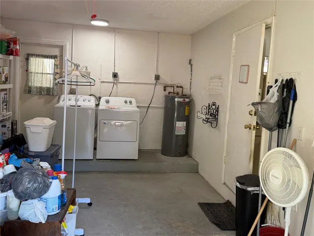 a view of a house with porch and furniture