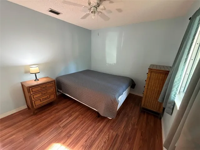 a view of a livingroom with wooden floor