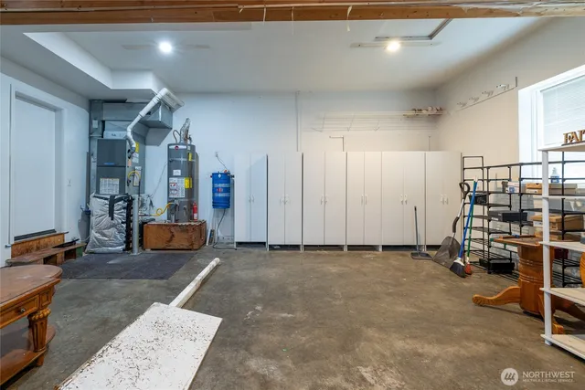 a backyard of a house with a tree