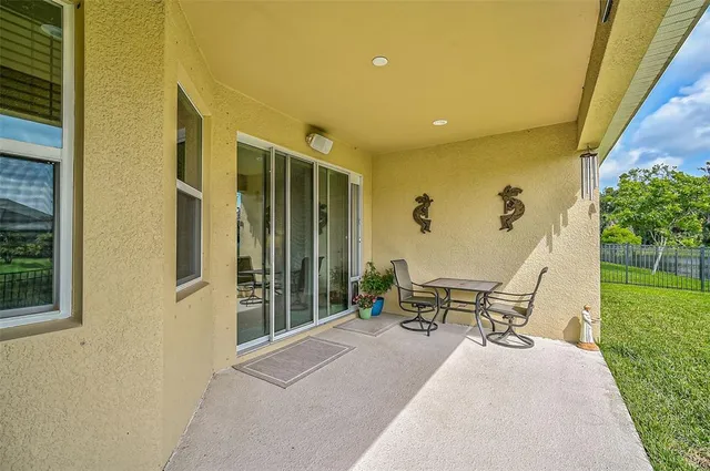 a view of backyard with green space