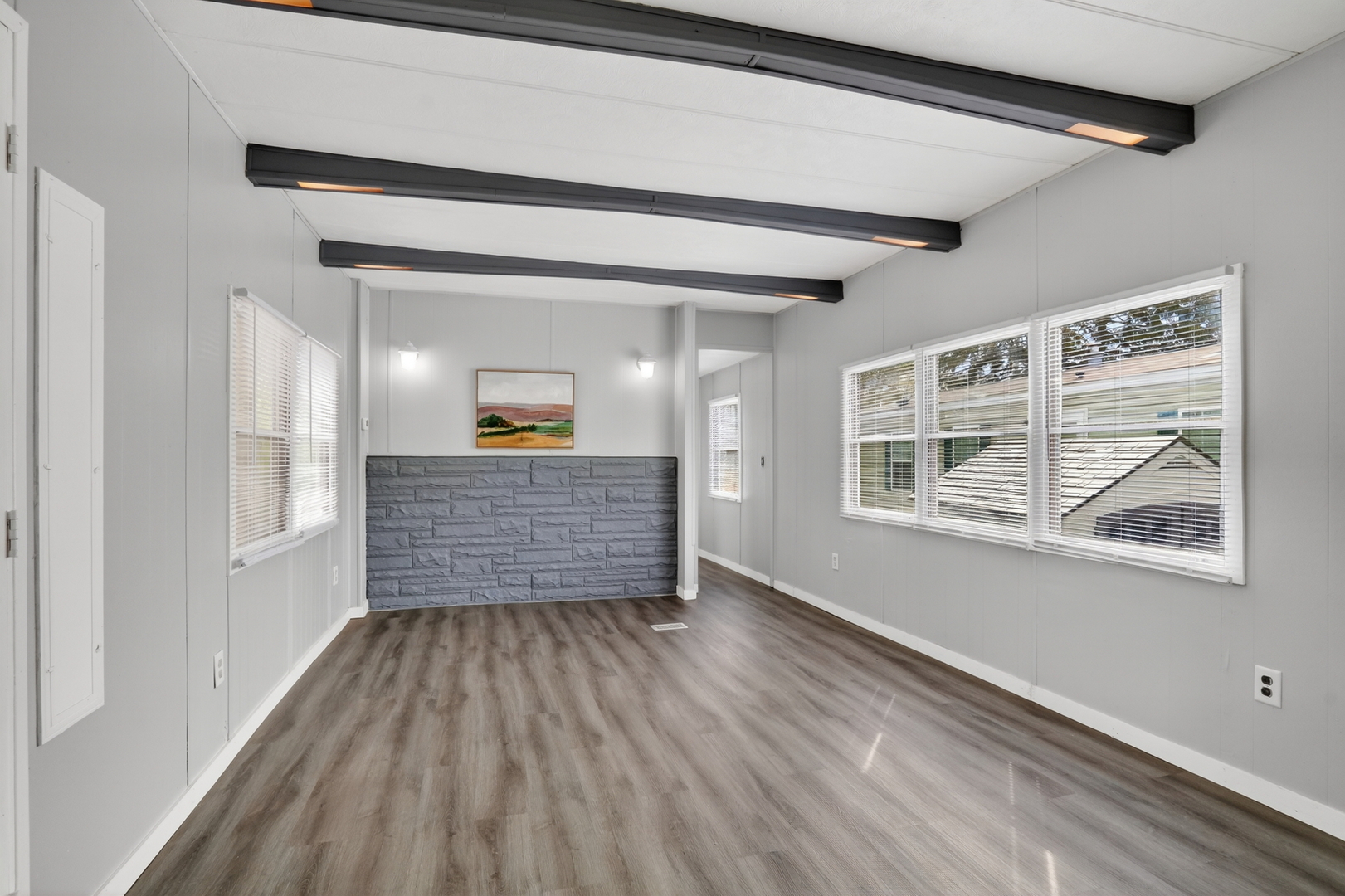 917 Lunga Drive Round Lake, IL 60073 - Photo 13 of 13 a view of a hallway view with wooden floor and a window