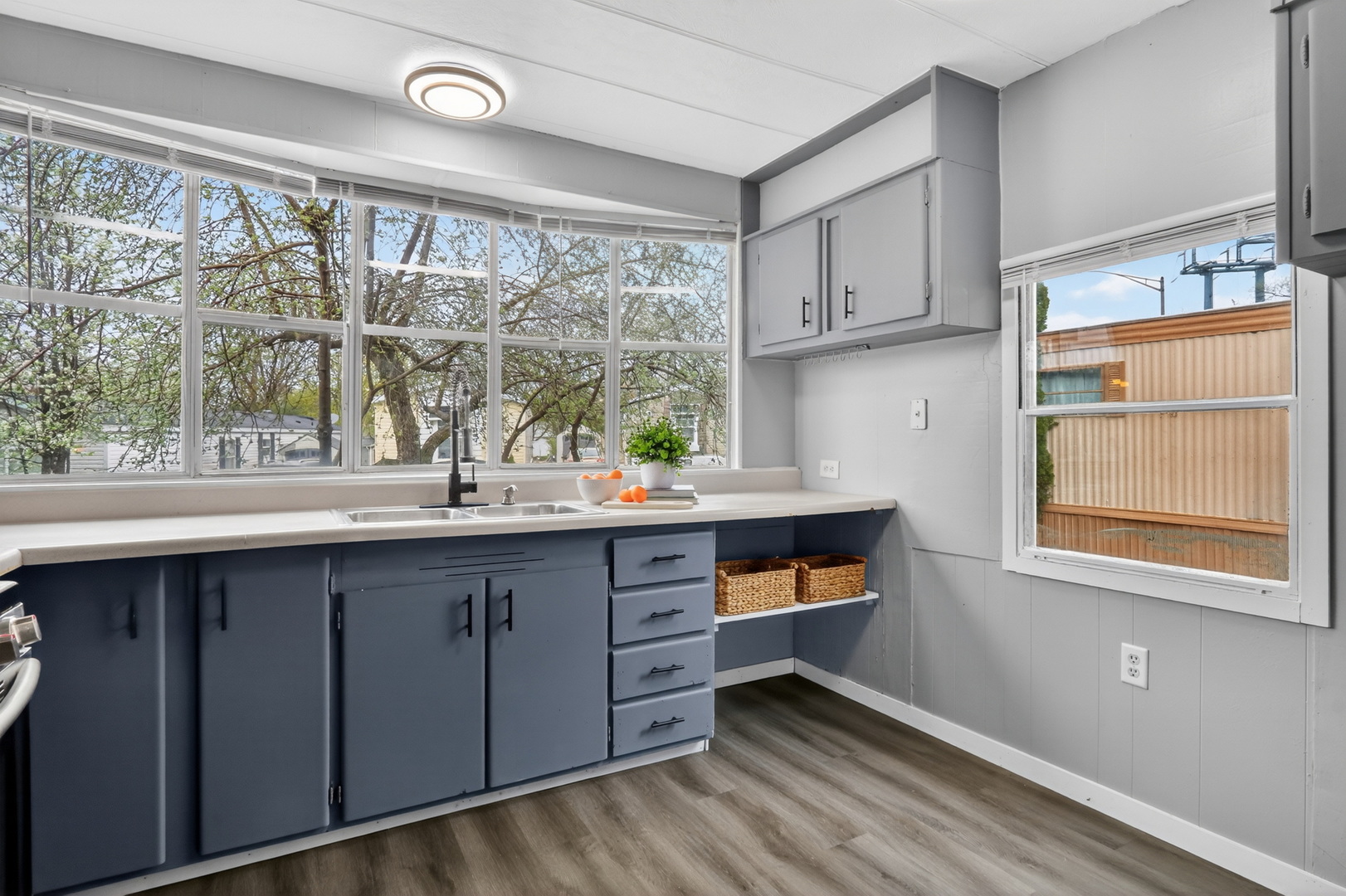 917 Lunga Drive Round Lake, IL 60073 - Photo 9 of 13 a kitchen with stainless steel appliances a sink and cabinets