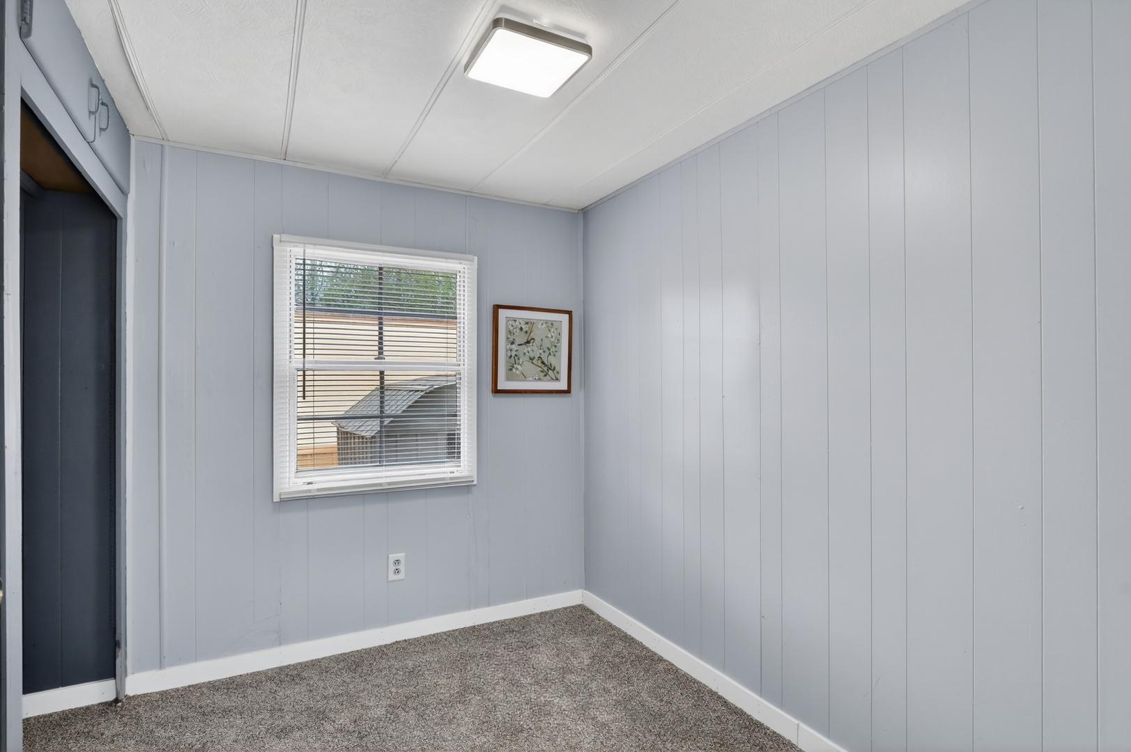 917 Lunga Drive Round Lake, IL 60073 - Photo 10 of 13 a view of an empty room with a window