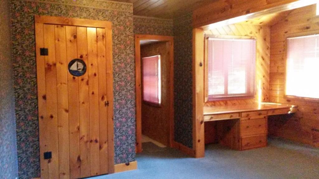 101 Rand Road Industry, ME 04938 - Photo 4 of 21 Master Bedroom with slider to deck &...