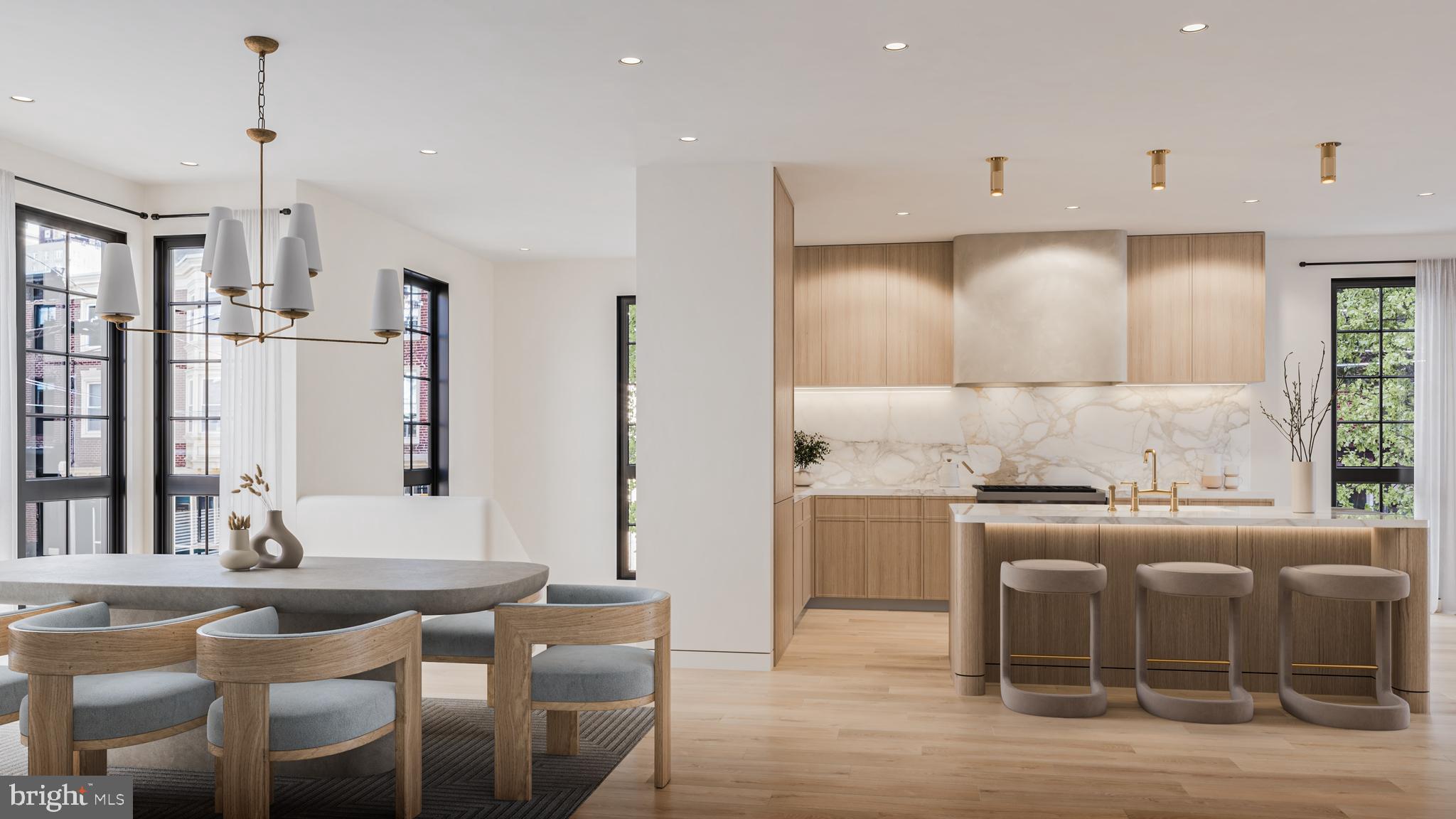 2004 Waverly Street Philadelphia, PA 19146 - Photo 7 of 20 a kitchen with stainless steel appliances granite countertop a table chairs stove and kitchen island